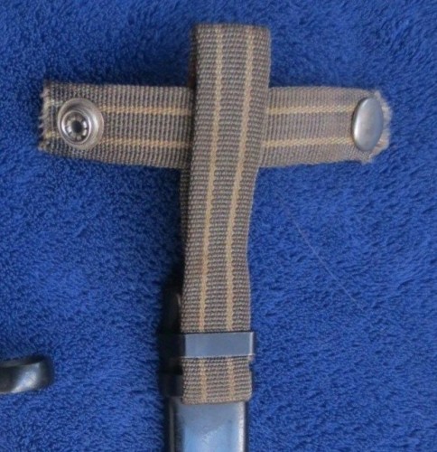East German AK47 Bayonet and scabbard with striped hanger and chipped grip 4.jpg